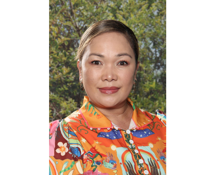 Female staff member smiling to camera