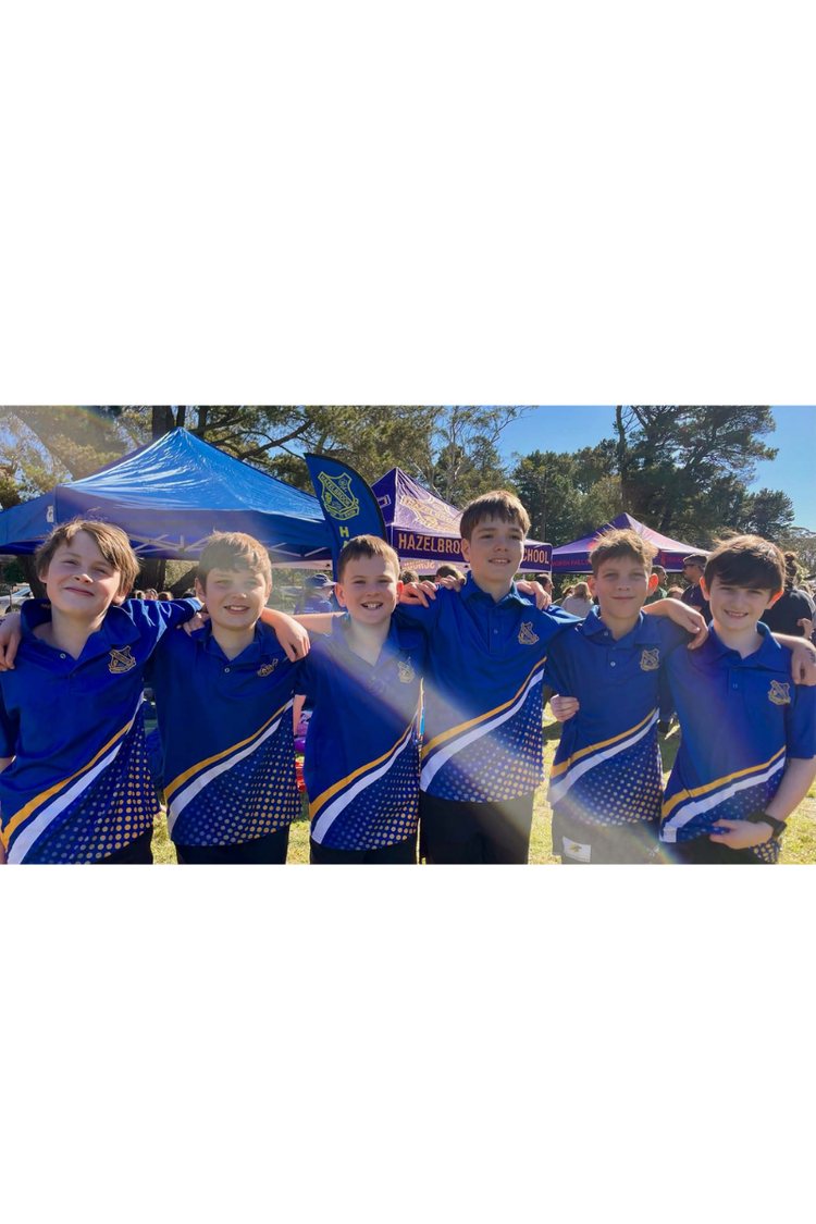Six male student with their arms around each other smiling to camera in a sports unifform